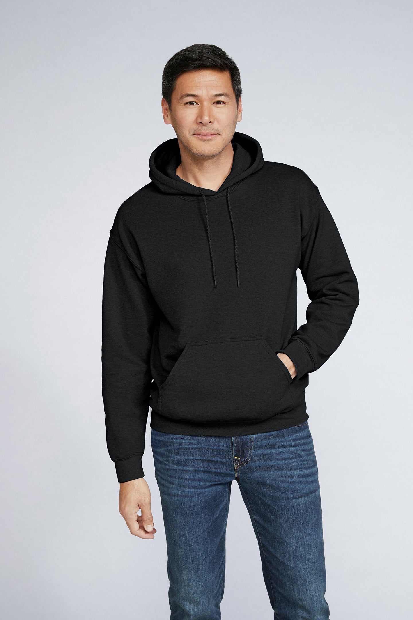 Hooded Sweatshirt | Heavy Blend black unisex pullover with double-lined hood and pouch pocket, cotton-polyester blend.