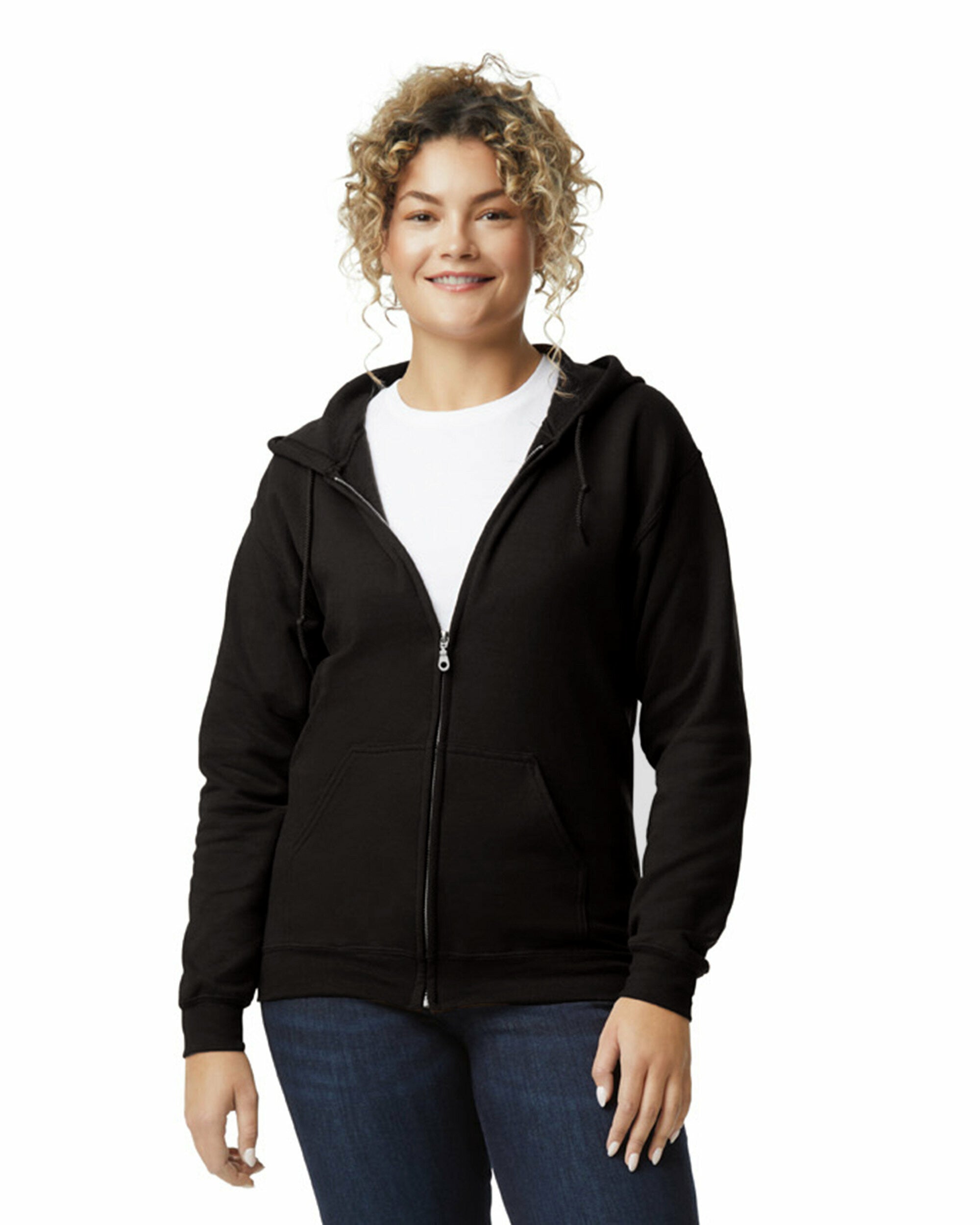Woman wearing black Full-Zip Hooded Sweatshirt Heavy Blend with front zipper and pouch pocket smiling.