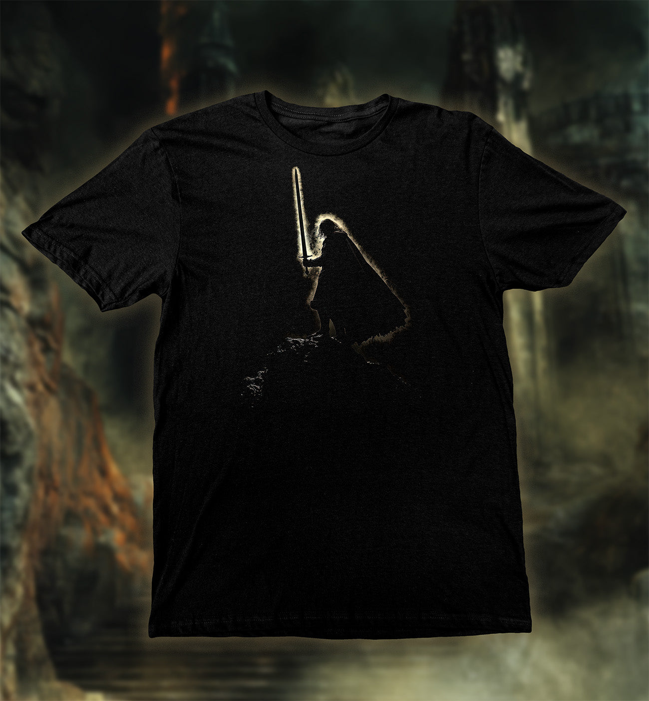 The Last Stand Hero T-Shirt featuring a medieval warrior holding a glowing sword standing on a rock.