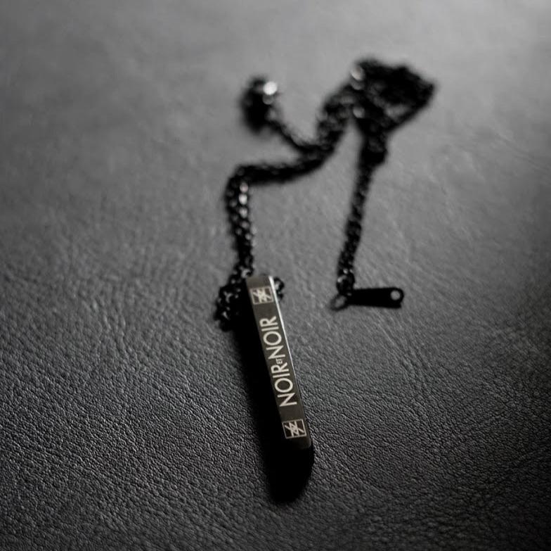 Custom Laser Engraved anti stress necklace with black stainless steel rectangular pendant and adjustable chain.