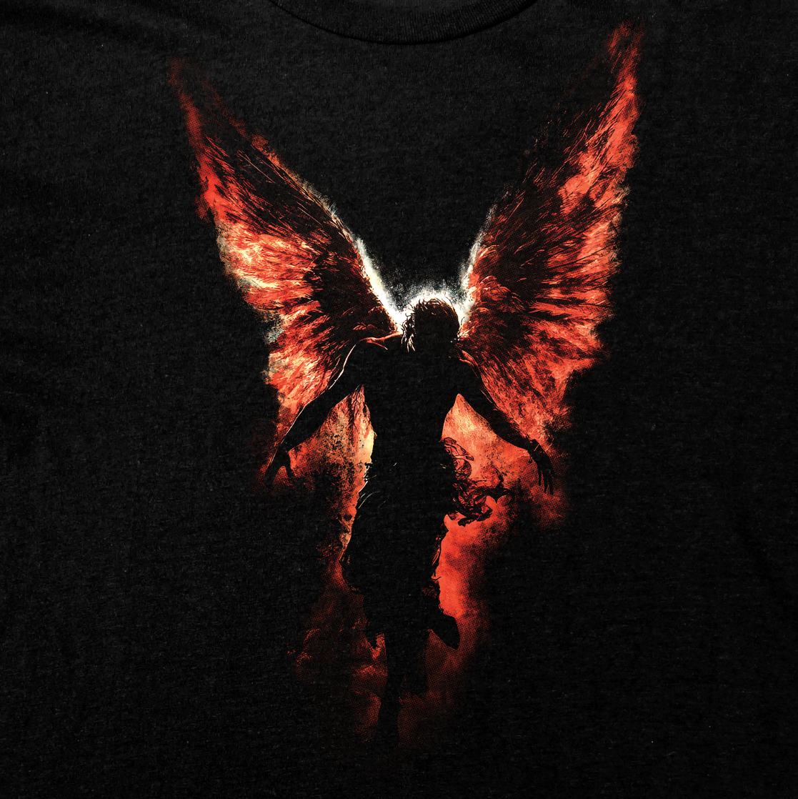 Fallen Angel T-Shirt featuring a shadowed celestial figure with flaming wings on a black background.
