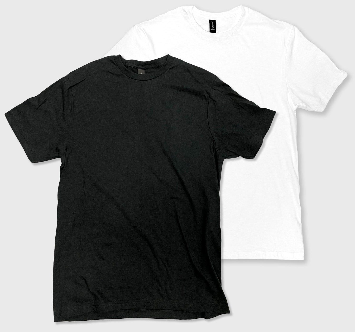 Men Unisex Softstyle 100% Cotton Tee in white and black, crew neck, short sleeves, modern classic fit.