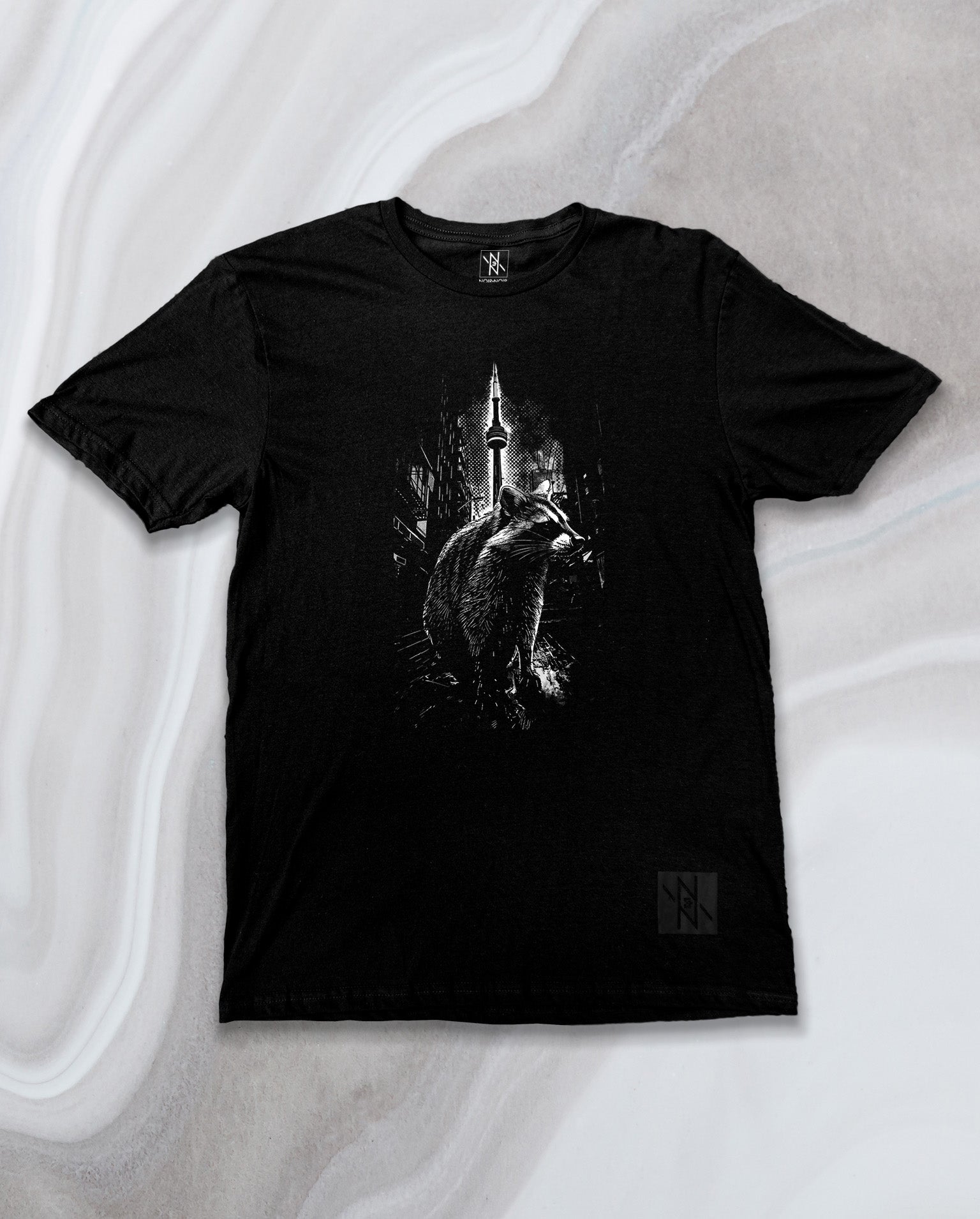 Front view of the Noir et Noir Toronto Urban Raccoon T-shirt, showcasing the unique black-on-black raccoon design. Perfect for urban fashion and raccoon enthusiasts. Available now in the Toronto Collection.