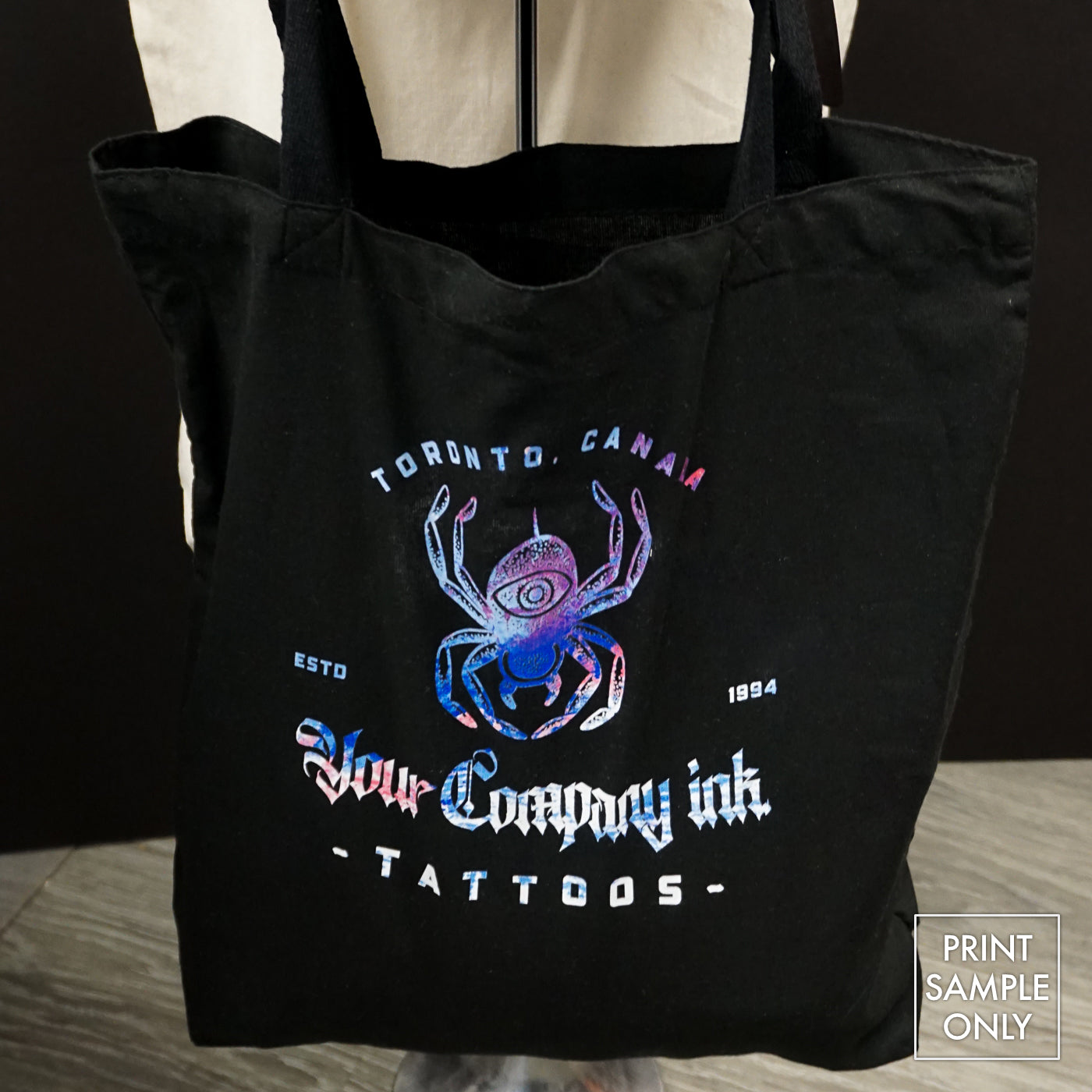 Noirtees by Noir et Noir, photo of a customized black lightweight totebag - Front zoomed 1