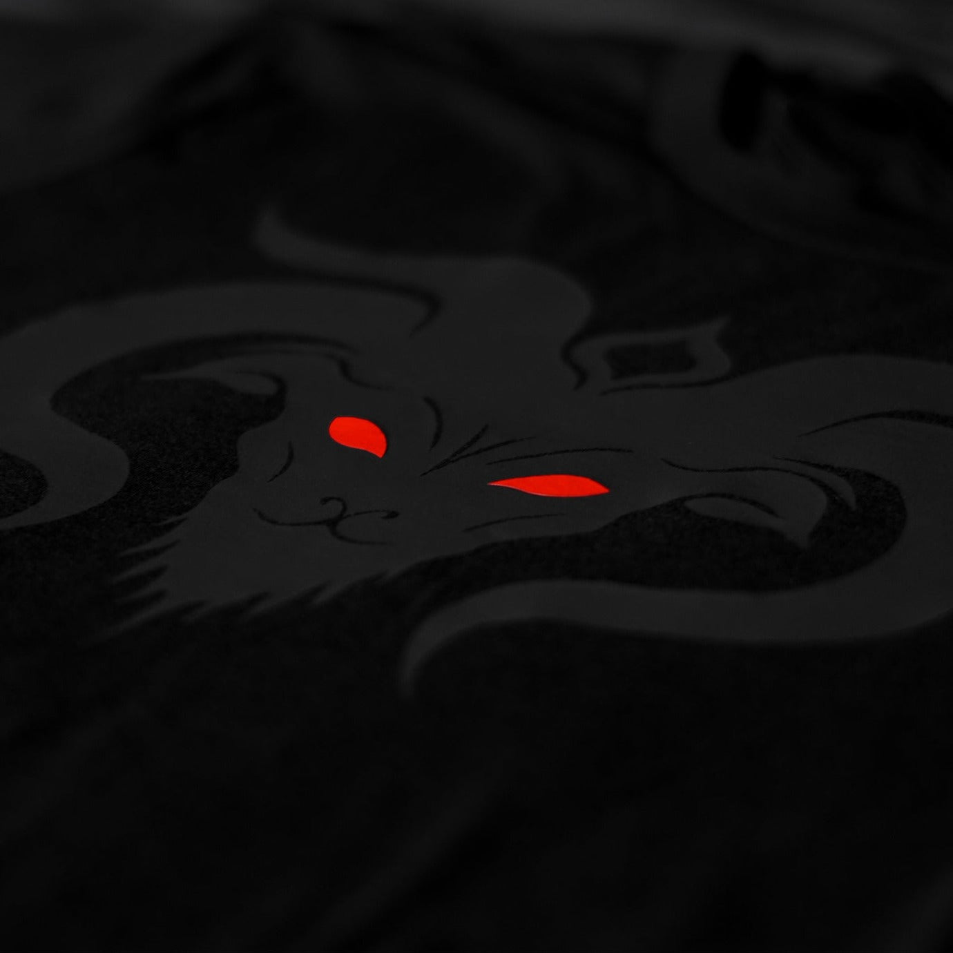 Close-up of the Noir et Noir GOAT unisex T-shirt, highlighting the detailed black-on-black matte print of the GOAT design. Perfect for those who appreciate subtle yet striking style. Part of the exclusive Design Collection