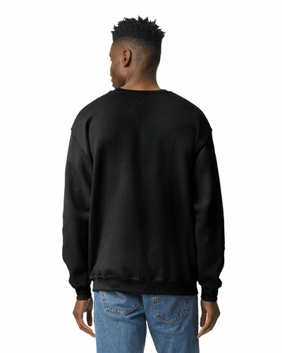 Crewneck Sweatshirt | Heavy Blend worn in black, showing back view with classic fit and ribbed cuffs.