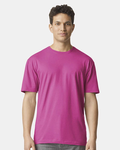Men / Unisex Colour Shirt | Softstyle 100% Cotton Tee in bright pink worn by a standing male model