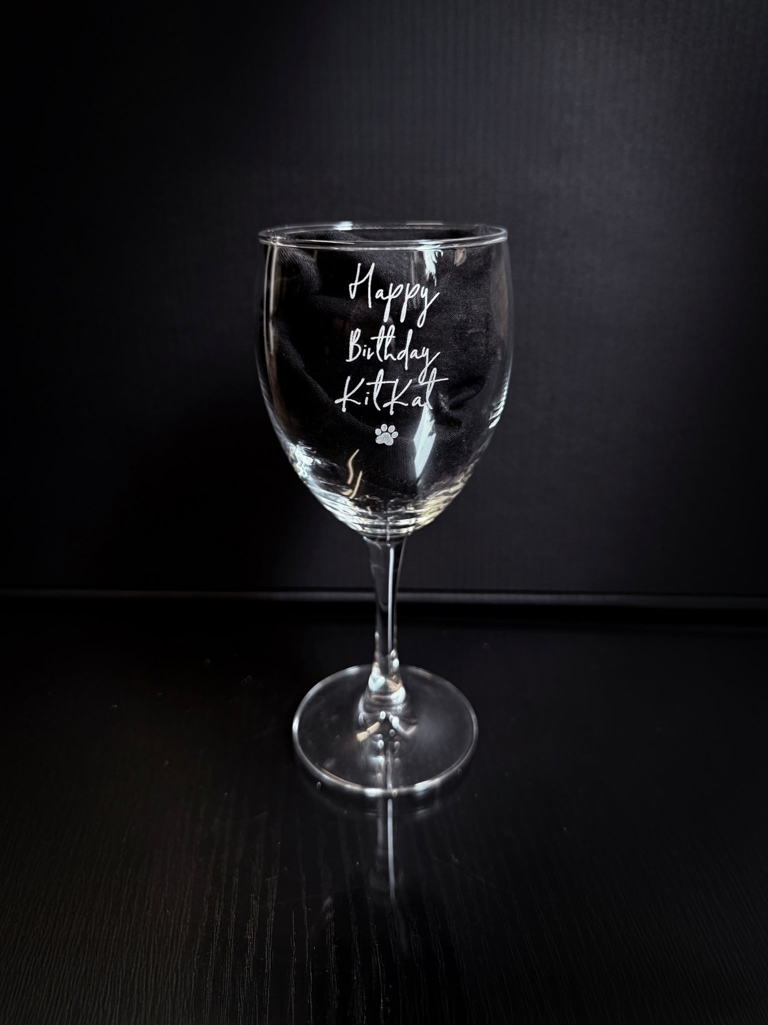 Custom Engraved Wine Glass – 11oz Tulip Design with "Happy Birthday KitKat" laser engraving on clear glass.