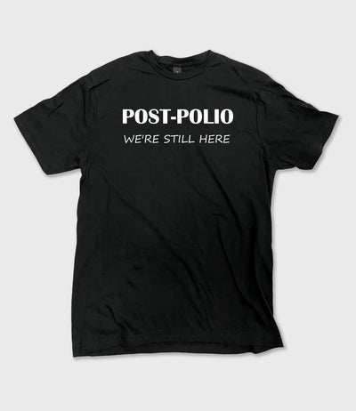 Black World Polio Day T-shirt with white text reading Post-Polio We're Still Here, soft fabric and classic fit.