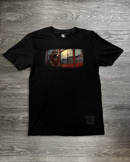 Front view of the Noir et Noir Commuter Coon T-shirt, showcasing its minimalist black design with a comfortable fit. Perfect for both casual and semi-formal occasions. Available now in the Toronto Collection.