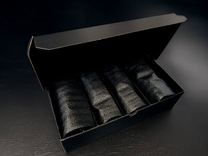 Custom Engraved Wine Glass – 11oz Tulip Design set of four glasses in a black gift box with black fabric wraps.