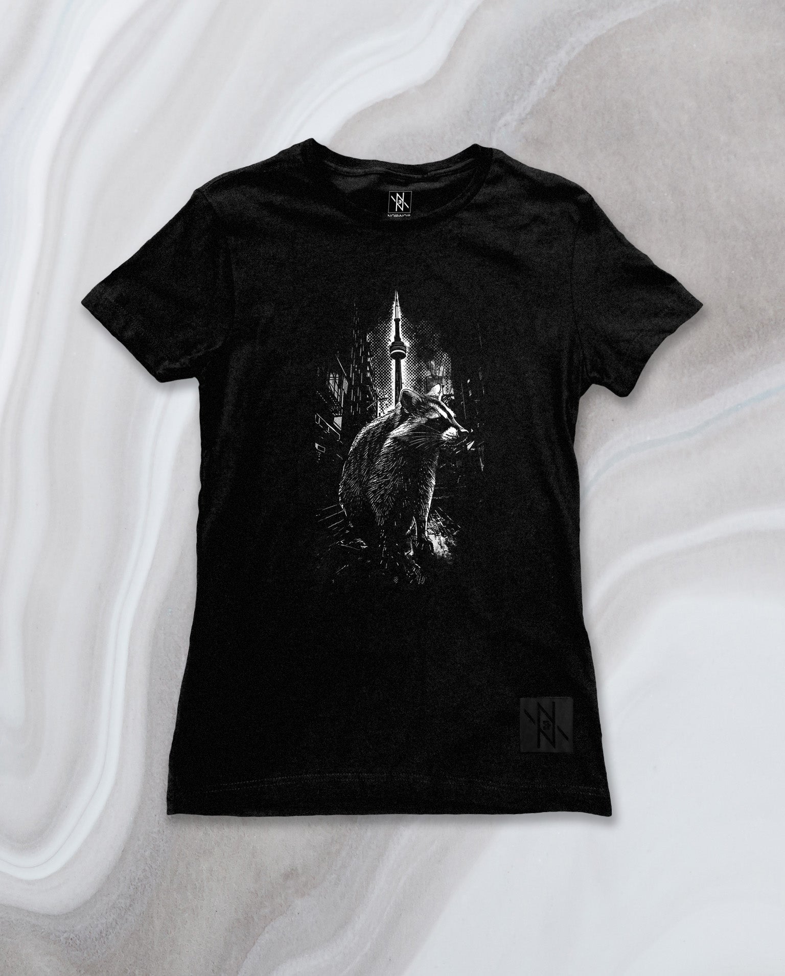 Front view of the Noir et Noir Toronto Urban Raccoon Women's T-shirt, showcasing the unique black-on-black raccoon design. Perfect for urban fashion and raccoon enthusiasts. Available now in the Toronto Collection.