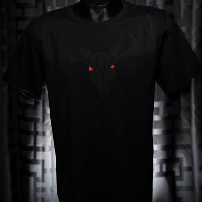 Noir et Noir Moose unisex T-shirt displayed against a dark background, emphasizing the detailed black-on-black moose design and the shirt's elegant fit. Capturing the essence of the Design Collection.