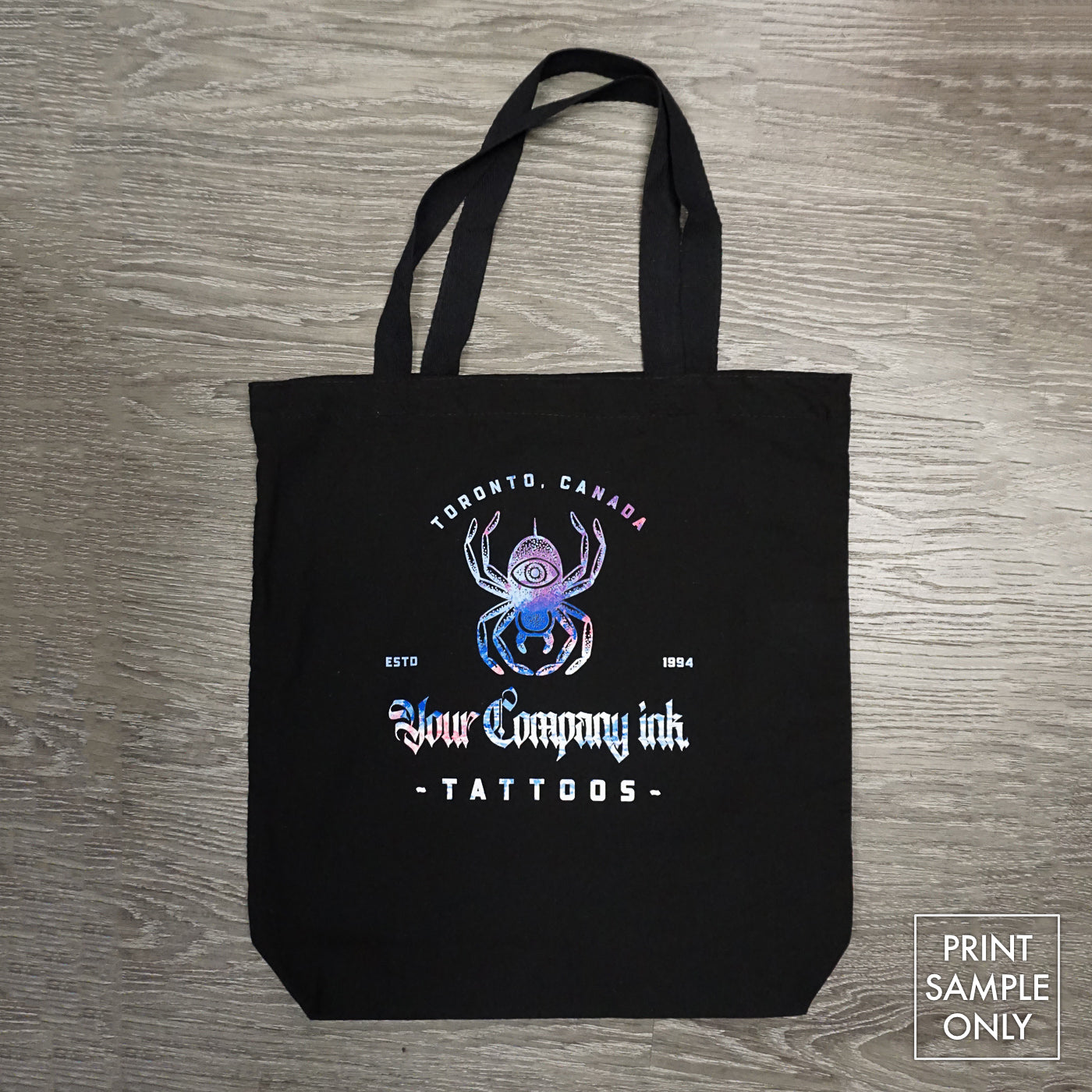 Noirtees by Noir et Noir, photo of a customized black lightweight totebag - Front - printed